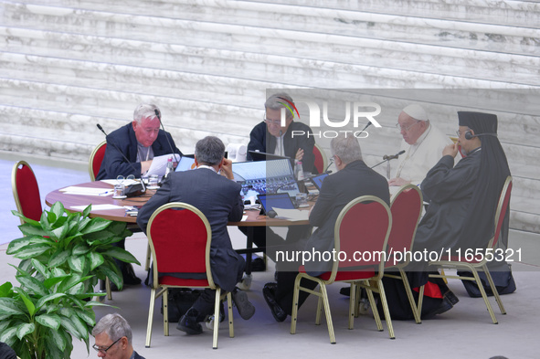 Pope Francis attends the Instrumentum laboris part II at the Paolo VI Hall in the Vatican on October 10, 2024. 