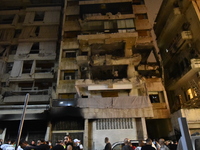 Teams conduct search and rescue operations at the scene after the Israeli army launches an airstrike on the Nowayri area of Beirut, Lebanon,...