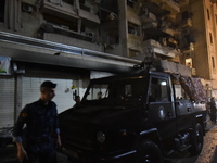 Teams conduct search and rescue operations at the scene after the Israeli army launches an airstrike on the Nowayri area of Beirut, Lebanon,...