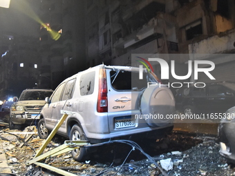 Teams conduct search and rescue operations at the scene after the Israeli army launches an airstrike on the Nowayri area of Beirut, Lebanon,...