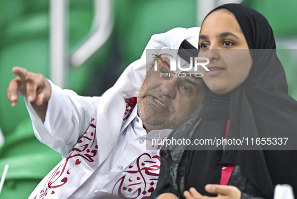 Qatar supporters cheer for their team during the FIFA World Cup 2026 AFC Asian Qualifiers 3rd round group A match between Qatar and Kyrgyzst...