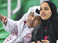 Qatar supporters cheer for their team during the FIFA World Cup 2026 AFC Asian Qualifiers 3rd round group A match between Qatar and Kyrgyzst...