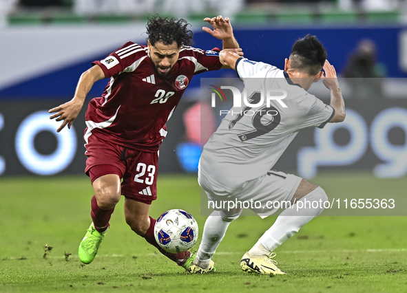 Abdelrahman Fahmi Moustafa of Qatar battles for the ball with Alimardo Shukurov of Kyrgyzstan during the FIFA World Cup 2026 AFC Asian Quali...