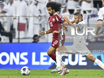 Akram Afif of Qatar battles for the ball with Abdurakhmanov Odilzhon of Kyrgyzstan during the FIFA World Cup 2026 AFC Asian Qualifiers 3rd r...