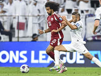 Akram Afif of Qatar battles for the ball with Abdurakhmanov Odilzhon of Kyrgyzstan during the FIFA World Cup 2026 AFC Asian Qualifiers 3rd r...