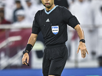 Referee Muhammad Taqi of Singapore gestures during the FIFA World Cup 2026 AFC Asian Qualifiers 3rd round group A match between Qatar and Ky...