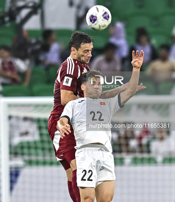 Lucas Mendes of Qatar battles for the ball with Alimardo Shukurov of Kyrgyzstan during the FIFA World Cup 2026 AFC Asian Qualifiers 3rd roun...