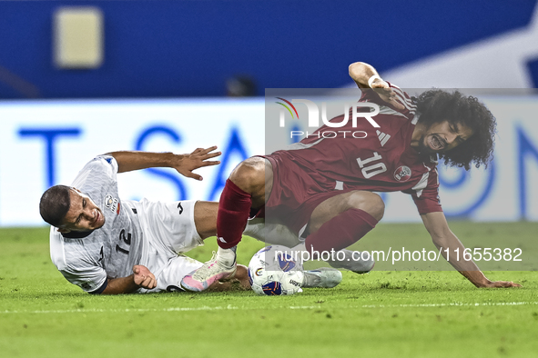 Akram Afif of Qatar battles for the ball with Abdurakhmanov Odilzhon of Kyrgyzstan during the FIFA World Cup 2026 AFC Asian Qualifiers 3rd r...