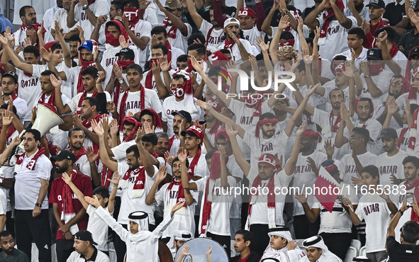 Qatar supporters cheer for their team during the FIFA World Cup 2026 AFC Asian Qualifiers 3rd round group A match between Qatar and Kyrgyzst...