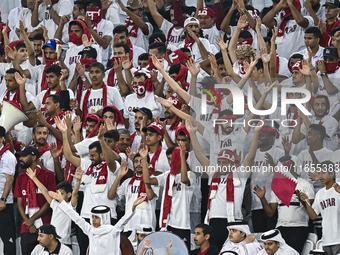 Qatar supporters cheer for their team during the FIFA World Cup 2026 AFC Asian Qualifiers 3rd round group A match between Qatar and Kyrgyzst...