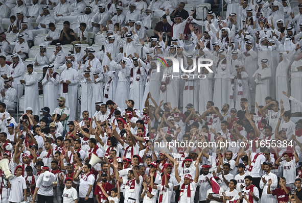 Qatar supporters cheer for their team during the FIFA World Cup 2026 AFC Asian Qualifiers 3rd round group A match between Qatar and Kyrgyzst...