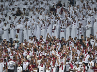 Qatar supporters cheer for their team during the FIFA World Cup 2026 AFC Asian Qualifiers 3rd round group A match between Qatar and Kyrgyzst...