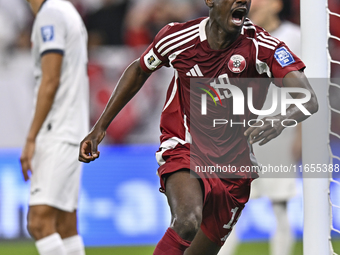 Almoez Ali of Qatar celebrates after scoring the opening goal during the FIFA World Cup 2026 AFC Asian Qualifiers 3rd round group A match be...