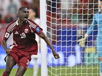 Almoez Ali of Qatar celebrates after scoring the opening goal during the FIFA World Cup 2026 AFC Asian Qualifiers 3rd round group A match be...