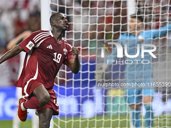 Almoez Ali of Qatar celebrates after scoring the opening goal during the FIFA World Cup 2026 AFC Asian Qualifiers 3rd round group A match be...