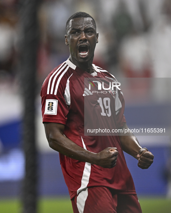 Almoez Ali of Qatar celebrates after scoring the opening goal during the FIFA World Cup 2026 AFC Asian Qualifiers 3rd round group A match be...