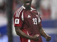 Almoez Ali of Qatar celebrates after scoring the opening goal during the FIFA World Cup 2026 AFC Asian Qualifiers 3rd round group A match be...