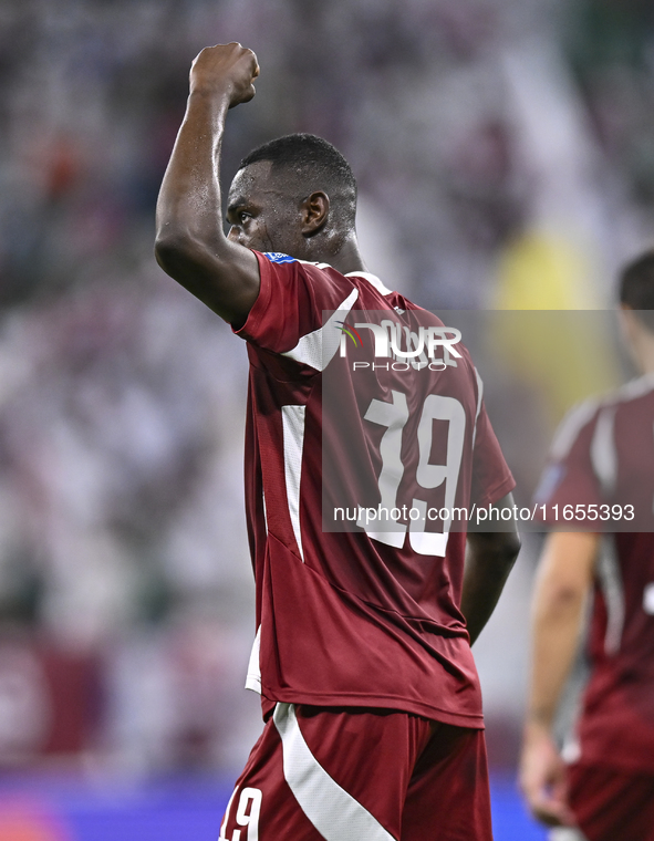 Almoez Ali of Qatar celebrates after scoring the opening goal during the FIFA World Cup 2026 AFC Asian Qualifiers 3rd round group A match be...