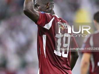 Almoez Ali of Qatar celebrates after scoring the opening goal during the FIFA World Cup 2026 AFC Asian Qualifiers 3rd round group A match be...