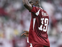 Almoez Ali of Qatar celebrates after scoring the opening goal during the FIFA World Cup 2026 AFC Asian Qualifiers 3rd round group A match be...