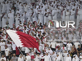 Qatar supporters cheer for their team during the FIFA World Cup 2026 AFC Asian Qualifiers 3rd round group A match between Qatar and Kyrgyzst...