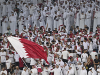 Qatar supporters cheer for their team during the FIFA World Cup 2026 AFC Asian Qualifiers 3rd round group A match between Qatar and Kyrgyzst...