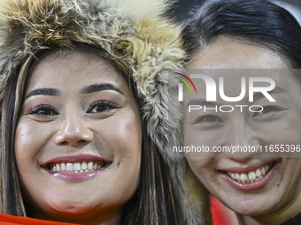 Kyrgyzstan supporters cheer for their team during the FIFA World Cup 2026 AFC Asian Qualifiers 3rd round group A match between Qatar and Kyr...