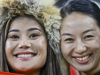 Kyrgyzstan supporters cheer for their team during the FIFA World Cup 2026 AFC Asian Qualifiers 3rd round group A match between Qatar and Kyr...