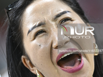 A fan from Kyrgyzstan cheers for their team before the FIFA World Cup 2026 AFC Asian Qualifiers 3rd round group A match between Qatar and Ky...