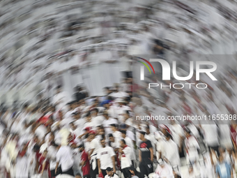 Qatar supporters cheer for their team during the FIFA World Cup 2026 AFC Asian Qualifiers 3rd round group A match between Qatar and Kyrgyzst...