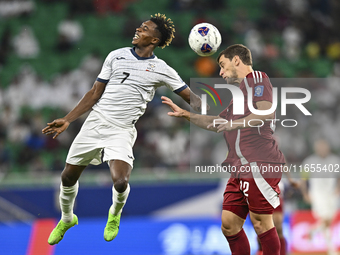 Lucas Mendes of Qatar battles for the ball with Joel Kojo of Kyrgyzstan during the FIFA World Cup 2026 AFC Asian Qualifiers 3rd round group...