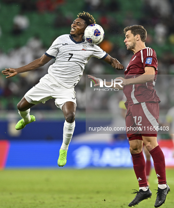 Lucas Mendes of Qatar battles for the ball with Joel Kojo of Kyrgyzstan during the FIFA World Cup 2026 AFC Asian Qualifiers 3rd round group...