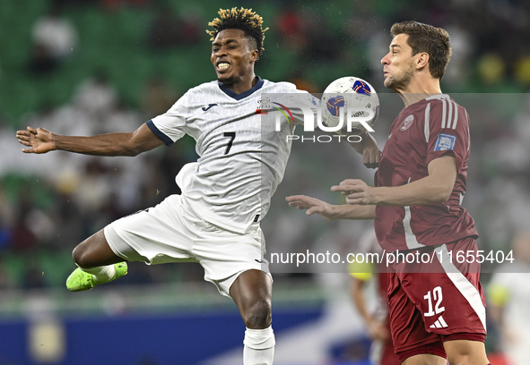 Lucas Mendes of Qatar battles for the ball with Joel Kojo of Kyrgyzstan during the FIFA World Cup 2026 AFC Asian Qualifiers 3rd round group...