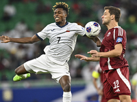 Lucas Mendes of Qatar battles for the ball with Joel Kojo of Kyrgyzstan during the FIFA World Cup 2026 AFC Asian Qualifiers 3rd round group...