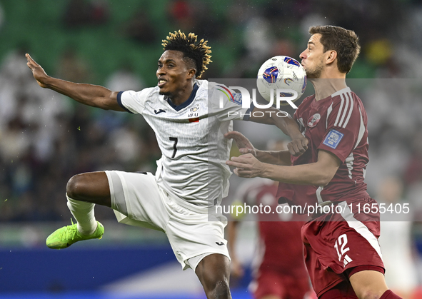 Lucas Mendes of Qatar battles for the ball with Joel Kojo of Kyrgyzstan during the FIFA World Cup 2026 AFC Asian Qualifiers 3rd round group...