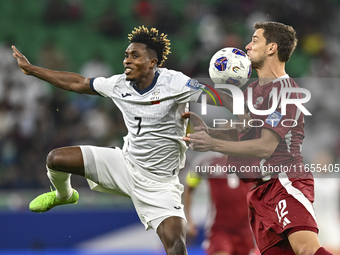 Lucas Mendes of Qatar battles for the ball with Joel Kojo of Kyrgyzstan during the FIFA World Cup 2026 AFC Asian Qualifiers 3rd round group...