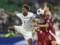 Lucas Mendes of Qatar battles for the ball with Joel Kojo of Kyrgyzstan during the FIFA World Cup 2026 AFC Asian Qualifiers 3rd round group...