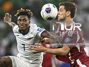 Lucas Mendes of Qatar battles for the ball with Joel Kojo of Kyrgyzstan during the FIFA World Cup 2026 AFC Asian Qualifiers 3rd round group...