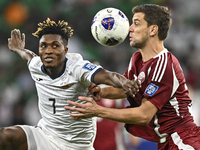 Lucas Mendes of Qatar battles for the ball with Joel Kojo of Kyrgyzstan during the FIFA World Cup 2026 AFC Asian Qualifiers 3rd round group...