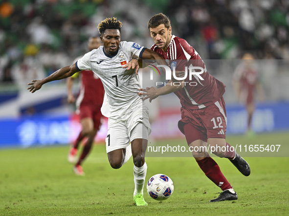 Lucas Mendes of Qatar battles for the ball with Joel Kojo of Kyrgyzstan during the FIFA World Cup 2026 AFC Asian Qualifiers 3rd round group...