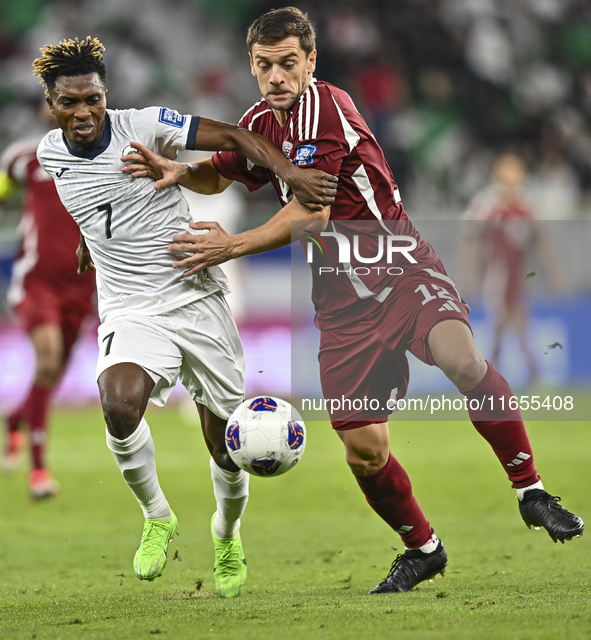 Lucas Mendes of Qatar battles for the ball with Joel Kojo of Kyrgyzstan during the FIFA World Cup 2026 AFC Asian Qualifiers 3rd round group...