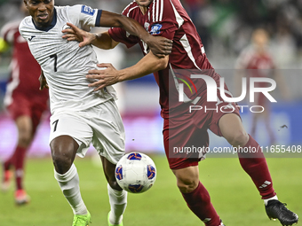 Lucas Mendes of Qatar battles for the ball with Joel Kojo of Kyrgyzstan during the FIFA World Cup 2026 AFC Asian Qualifiers 3rd round group...