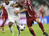 Lucas Mendes of Qatar battles for the ball with Joel Kojo of Kyrgyzstan during the FIFA World Cup 2026 AFC Asian Qualifiers 3rd round group...