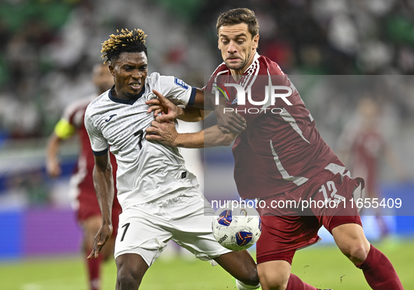 Lucas Mendes of Qatar battles for the ball with Joel Kojo of Kyrgyzstan during the FIFA World Cup 2026 AFC Asian Qualifiers 3rd round group...