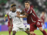 Lucas Mendes of Qatar battles for the ball with Joel Kojo of Kyrgyzstan during the FIFA World Cup 2026 AFC Asian Qualifiers 3rd round group...