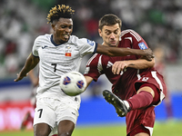 Lucas Mendes of Qatar battles for the ball with Joel Kojo of Kyrgyzstan during the FIFA World Cup 2026 AFC Asian Qualifiers 3rd round group...