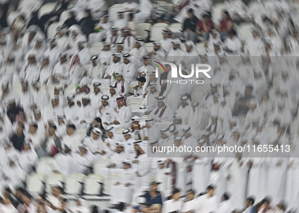 Qatar supporters cheer for their team during the FIFA World Cup 2026 AFC Asian Qualifiers 3rd round group A match between Qatar and Kyrgyzst...