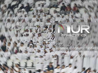 Qatar supporters cheer for their team during the FIFA World Cup 2026 AFC Asian Qualifiers 3rd round group A match between Qatar and Kyrgyzst...