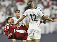 Edmilson Junior Dasilva of Qatar battles for the ball with Abdurakhmanov Odilzhon of Kyrgyzstan during the FIFA World Cup 2026 AFC Asian Qua...