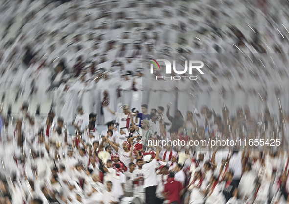 Qatar supporters cheer for their team during the FIFA World Cup 2026 AFC Asian Qualifiers 3rd round group A match between Qatar and Kyrgyzst...